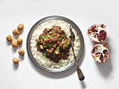 Persian chicken ragout with walnuts and pomegranate seeds