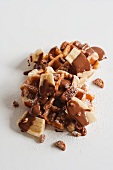 Waffle with Banana, Nuts and Chocolate Sauce on White