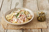 Spaghetti carbonara with capers