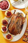 Roasted duck with apples, cranberries and red cabbage