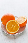 Oranges, whole and halved