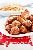 Italian Meat Sauce; Meatballs, and Sausage in Tomato Sauce; Bowl of Pasta