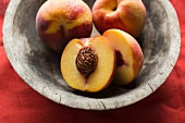 Fresh Peaches in a Bowl; Whole and Halved