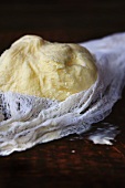 Homemade Butter in Cheesecloth