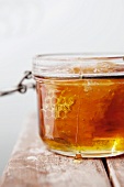 Honey and Honeycomb in a Glass Jar