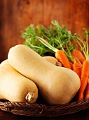 Butternut squash and carrots in a basket