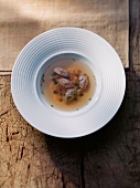 Game broth with liver dumplings