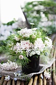 Bouquet made of nigella, pink roses, cow parsley and carnations