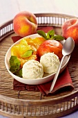 Poached peaches with vanilla ice cream