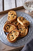 Savoury palmiers with olives, thyme and parmesan