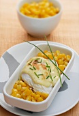 A poached egg sauce Hollandaise and sweetcorn