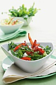 Rocket salad with peppers and ham