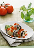 Aubergine rolls with tomatoes