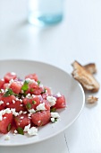 Serving of Watermelon and Feta Cheese Salad; Bread