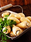 Parsnips and potatoes in a basket