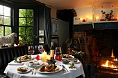 A table laid for Christmas dinner in rustic restaurant