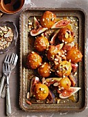 Deep-fried doughnuts with orange caramel and figs