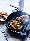 Grilled chicken with tomato and avocado salsa