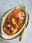 Baked Apricots with Almonds; In a Baking Dish with a Fork