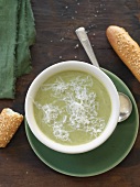 Bowl of Broccoli and Cheese Soup ; With Bread; From Above