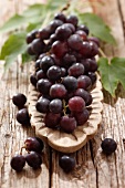 Red grapes in a wooden dish