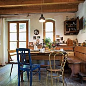 Seating area with corner bench in rustic kitchen