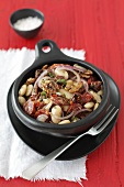 Lima beans with chorizo, dried tomatoes, red onions and walnuts