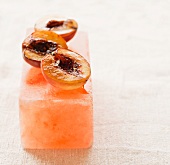 Cooked Peach Halves on a Pink Himalayan Salt Block