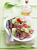 Lamb, cucumber, pepper and red onion salad