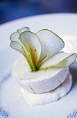 An apple dessert in a meringue dish