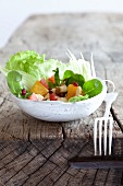 Mixed leaf salad with chicken and fruit