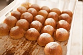 Freshly baked bread rolls topped with sugar