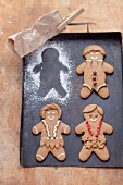 Gingerbread men on a baking tray