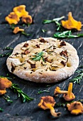 Focaccia topped with chanterelle mushrooms and rosemary