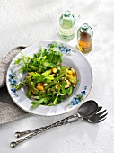 Asparagus and rocket salad with beans, figs and a mustard dressing