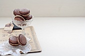 Chocolate macaroons filled with almond cream
