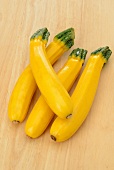 Four yellow courgettes