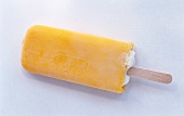 A yellow ice lolly