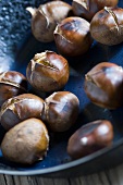 Roasted chestnuts in a pan