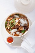 Rice noodle soup with braised tofu