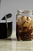 A jar of ingredients for vegan chocolate