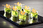 Vegetables and cucumber tonic with prawns on sticks