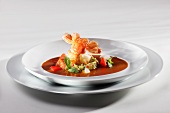 Fried crayfish tail with chorizo, avocado puree, pepper and crustacean bisque
