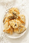 Puff pastry pockets with quark, olives and capers (Christmas)