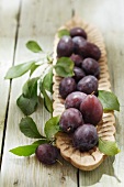 A bowl of plums