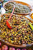 A bowl of black and green olives