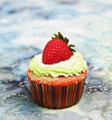 Strawberry Cupcake with Lime Frosting and a Whole Fresh Strawberry