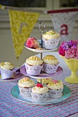 A selection of cupcakes on a cake stand