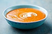 Cream of carrot soup with a dollop of cream