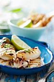Grilled squid with lemons, olive oil and parsley
